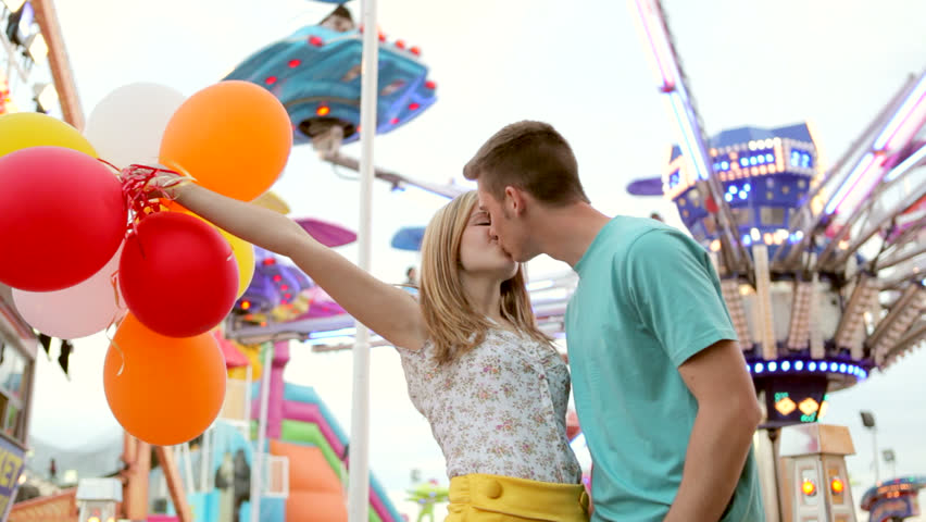 Faire un tour dans une fête foraine 