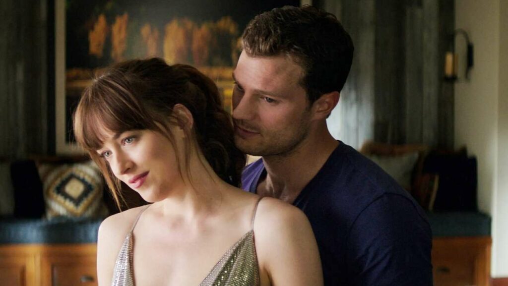 Christian et Anastasia dans le film 50 Nuances de Grey