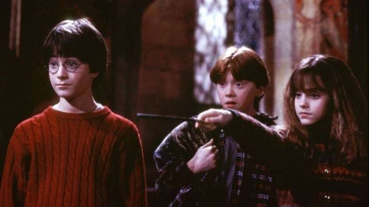 Harry Potter, Ron Weasley et Hermione Granger dans le film Harry Potter à l'école des sorciers