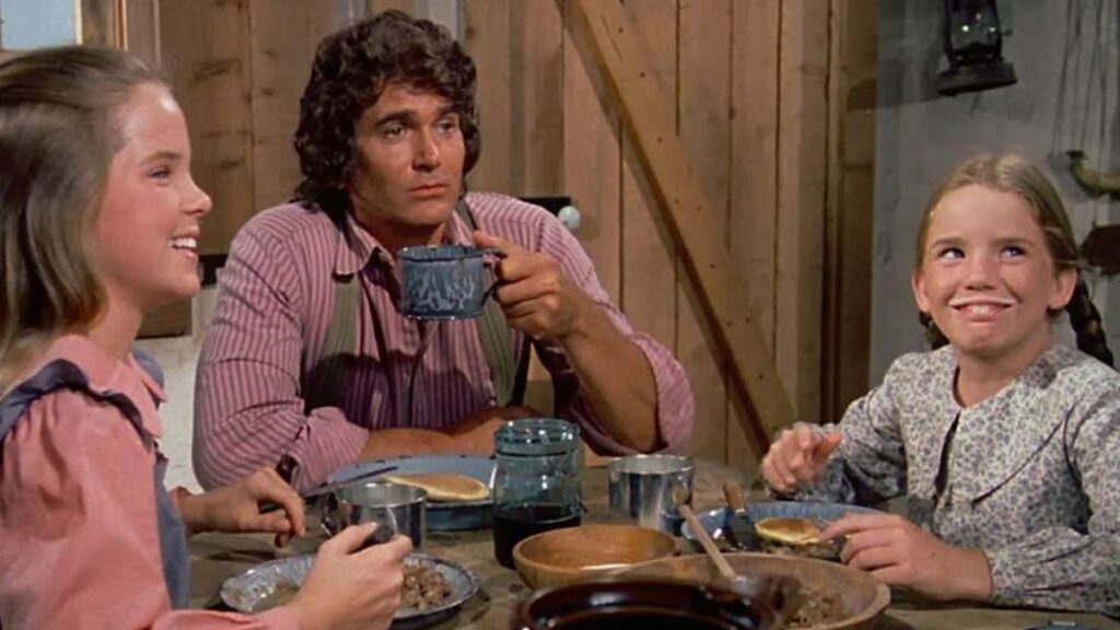 Charles Ingalls et ses filles Laura et Mary dans La Petite Maison dans la Prairie.