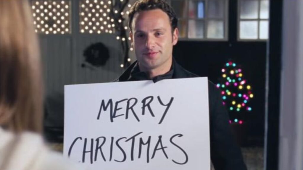 Mark (Andrew Lincoln) dans la scène des pancartes de Love Actually