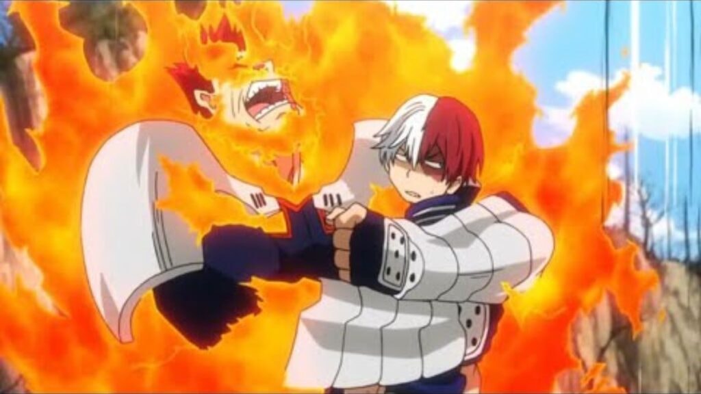 Endeavor prenant son fils Shoto dans ses bras dans l'anime My Hero Academia