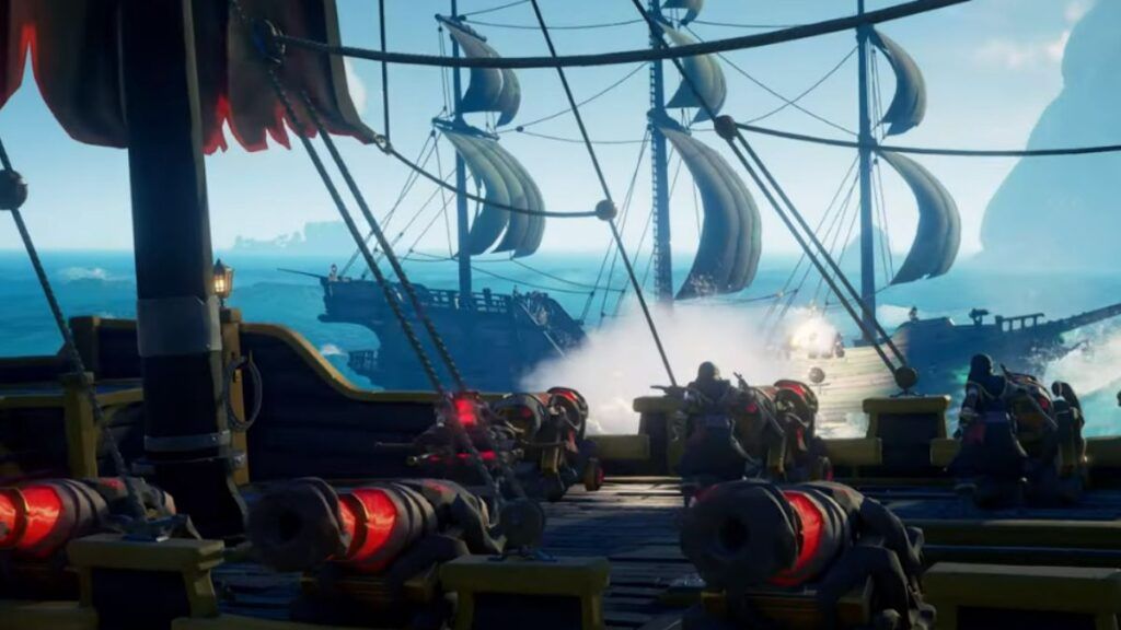Deux équipages de pirates en train de s'affronter en mer dans le jeu vidéo Sea of Thieves