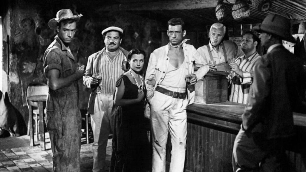 Yves Montand, Charles Vanel, Folco Lulli et Peter Van Eyck dans le film Le Salaire de la Peur.