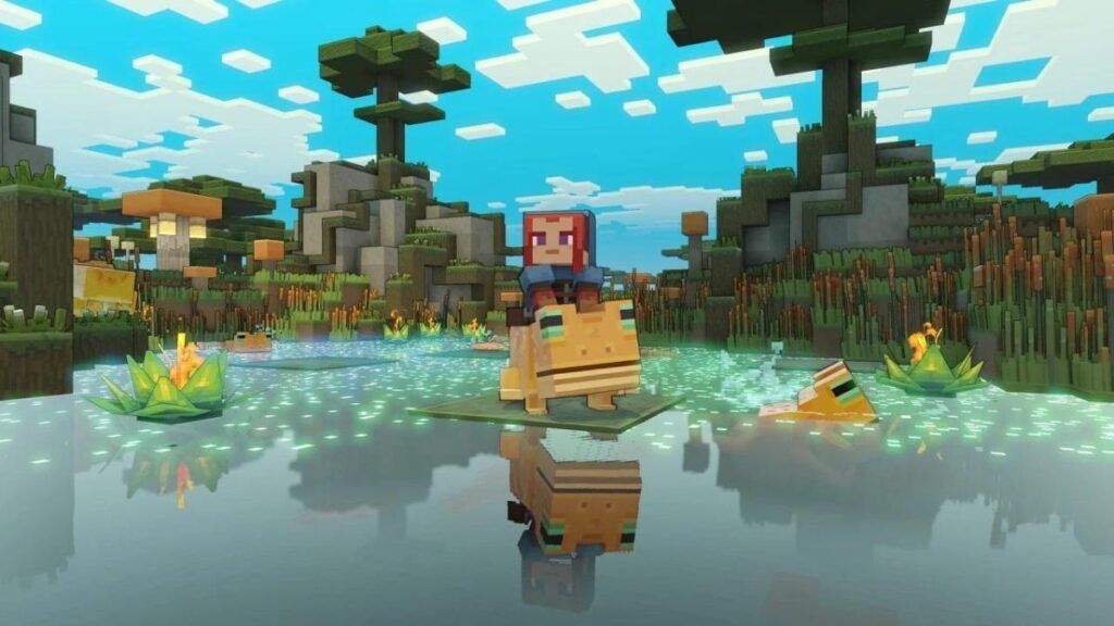 Le personnage du joueur chevauchant une grenouille dans le jeu vidéo de stratégie Minecraft Legends