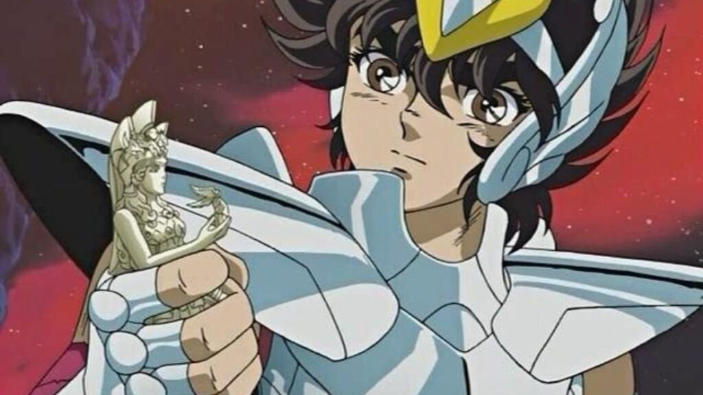 Seiya, le chevalier de Bronze de Pégase, tenant une statuette de la déesse Athéna dans sa main dans l'anime Les Chevaliers du Zodiaque