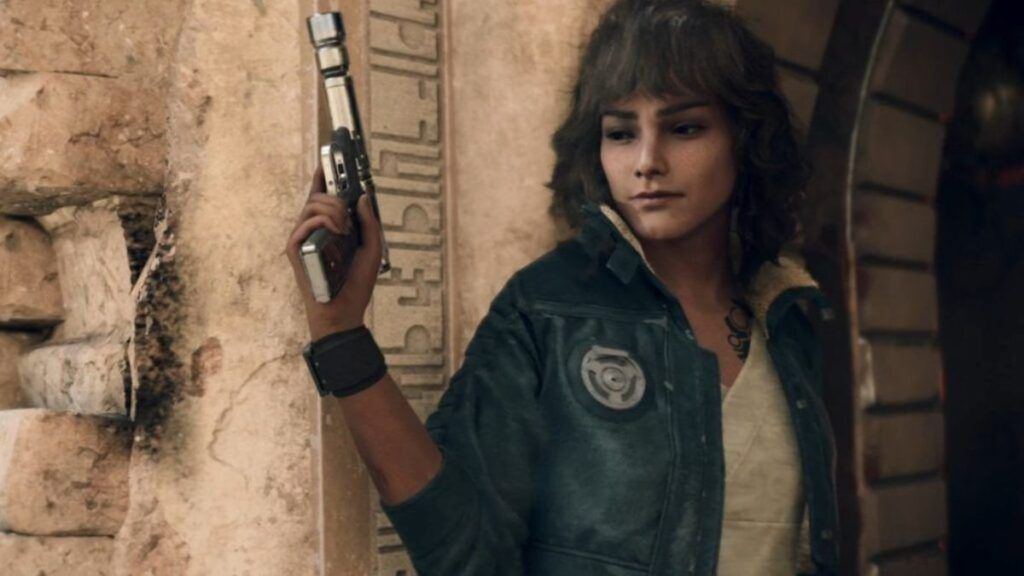 Kay Vess, tenant son blaster, prête à se battre dans le jeu vidéo Star Wars Outlaws