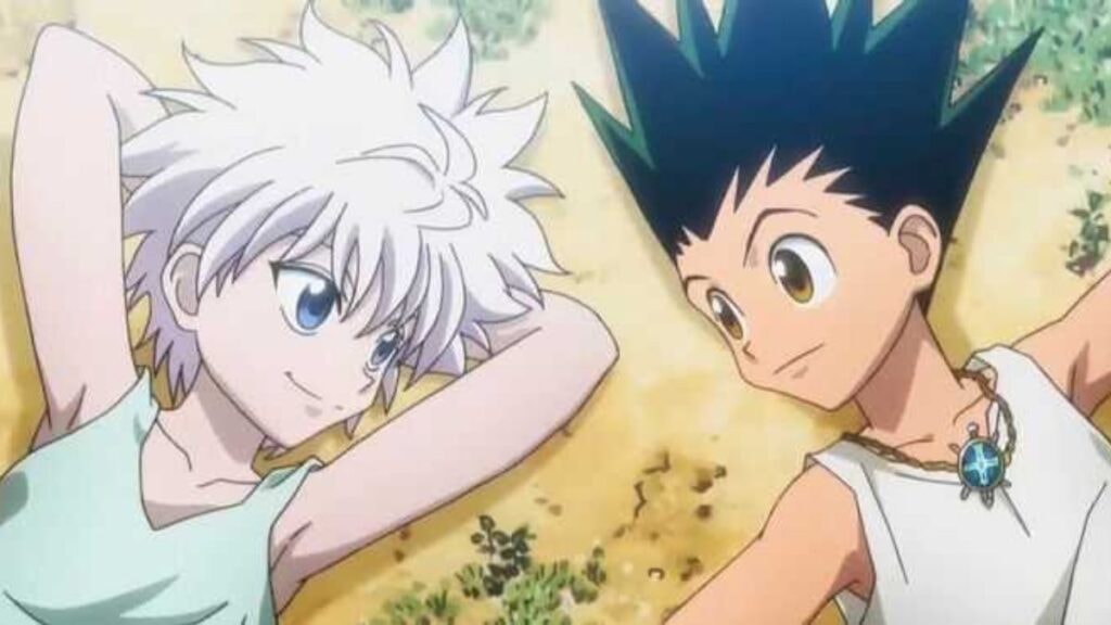 Gon et Kirua, allongés sur le sol de Greed Island, dans l'anime Hunter x Hunter