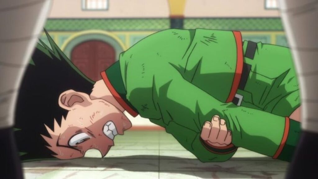 Gon, souffrant d'un bras cassé durant son combat contre Hanzo durant l'Examen Hunter dans l'anime Hunter x Hunter