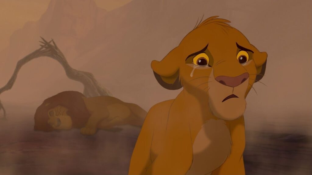 Simba triste pleure la mort de Mufasa dans Le Roi Lion