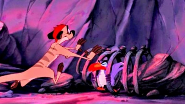 timon-libere-zazu-de-prison-le-roi-lion