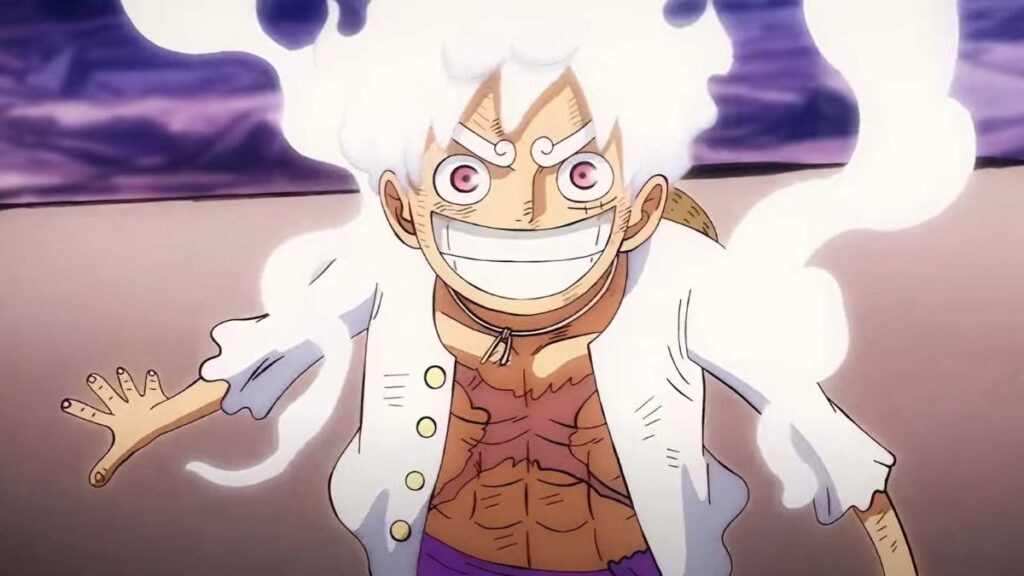 Luffy sous sa forme du Gear 5, souriant lors d'un combat, dans l'anime One Piece