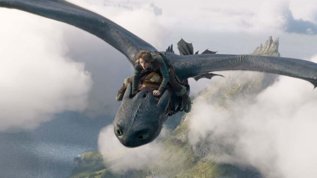 Harold vole sur le dos de Krokmou dans le film live-action Dragons