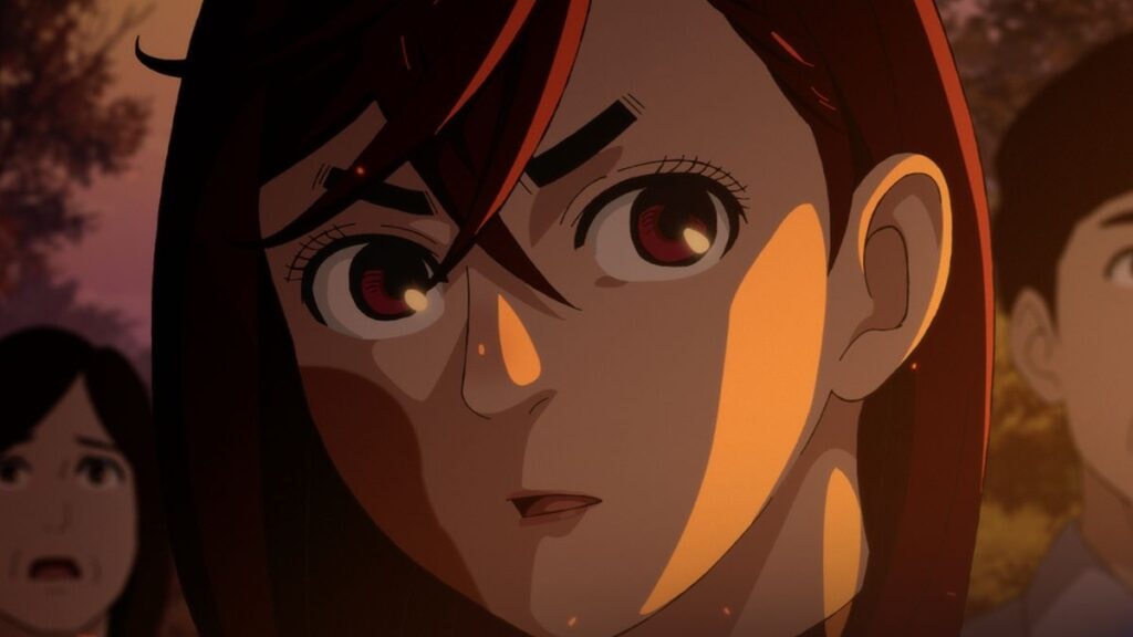 Momo affichant un regard inquiet pendant que la montagne est en feu dans Dan Da Dan Evil Eye