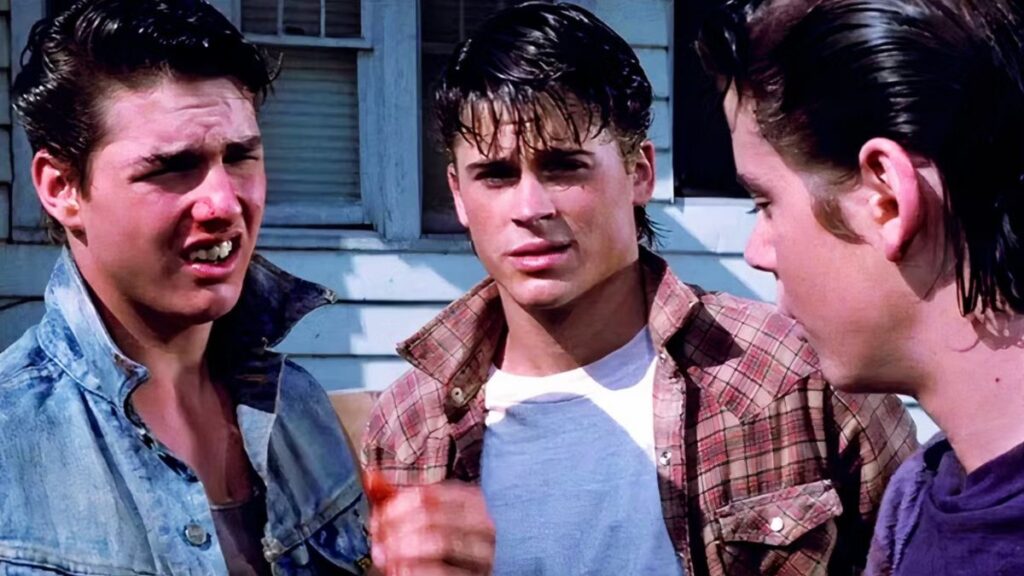 Tom Cruise et Rob Lowe dans le film Outsiders.