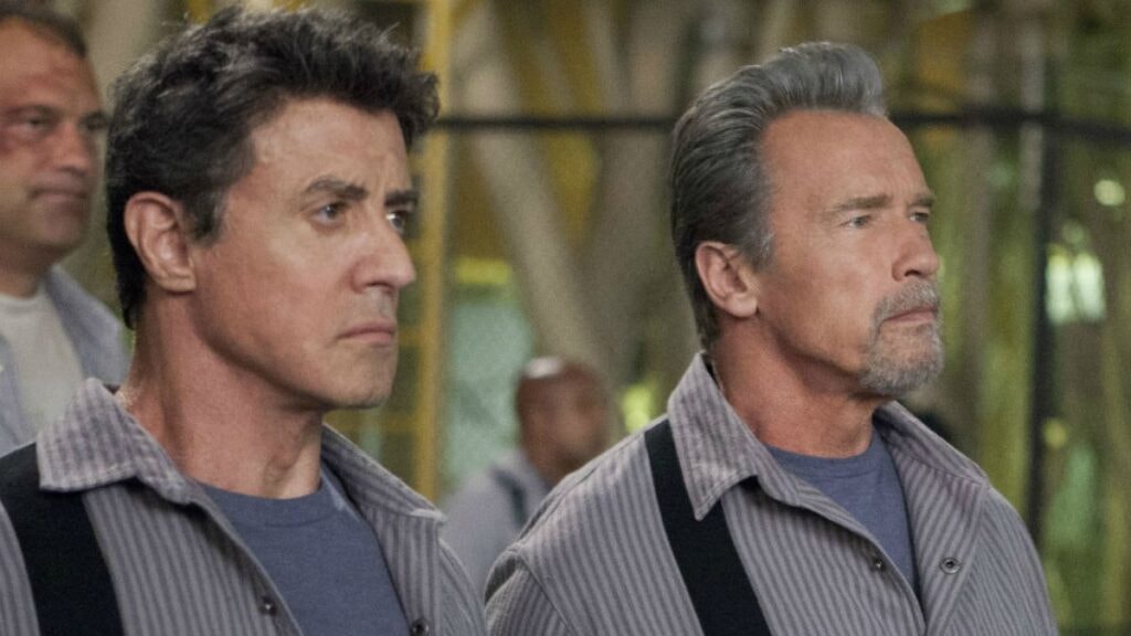 Arnold Schwarzenegger et Sylvester Stallone dans le film Evasion