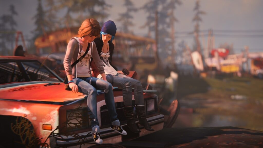 Max et Chloé assises sur une voiture dans une décharge de Life is Strange
