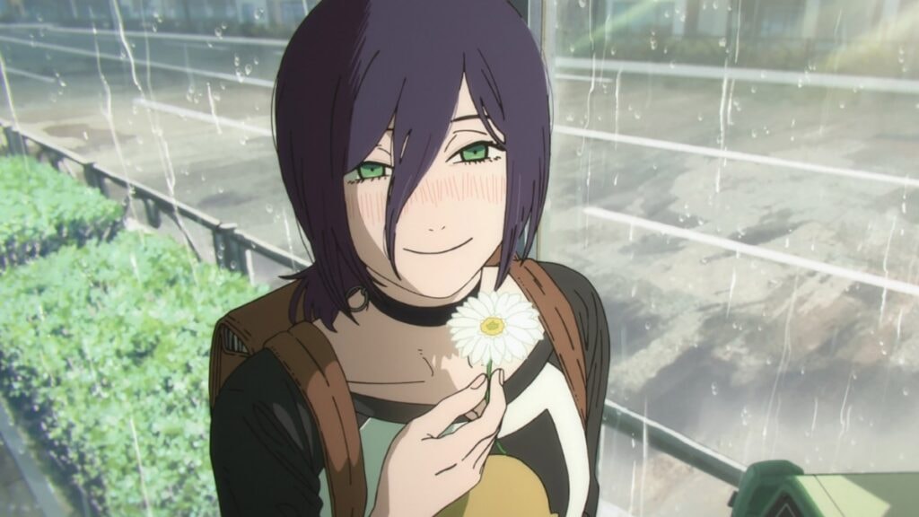 Reze souriant en tenant un fleur sous la pluie dans Chainsaw Man - Le film : L'arc de Reze