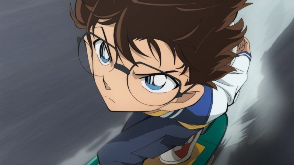 Conan allant à toute vitesse sur son skateboard dans Detective Conan : La Mémoire Retrouvée
