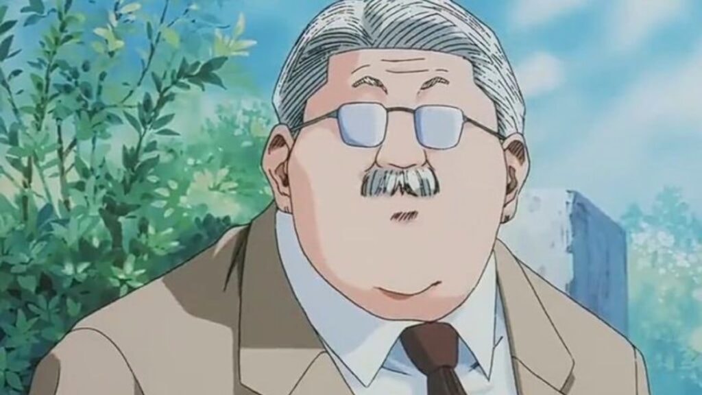 Le coach Anzai lançant un regard curieux dans Slam Dunk