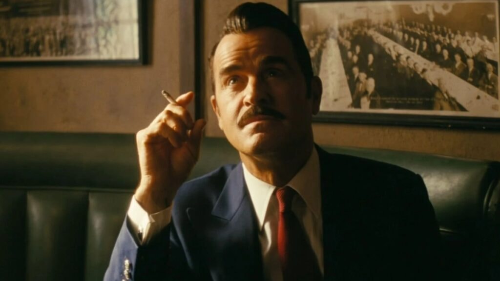 Robert House assis dans un bar arborant un visage confiant dans Fallout