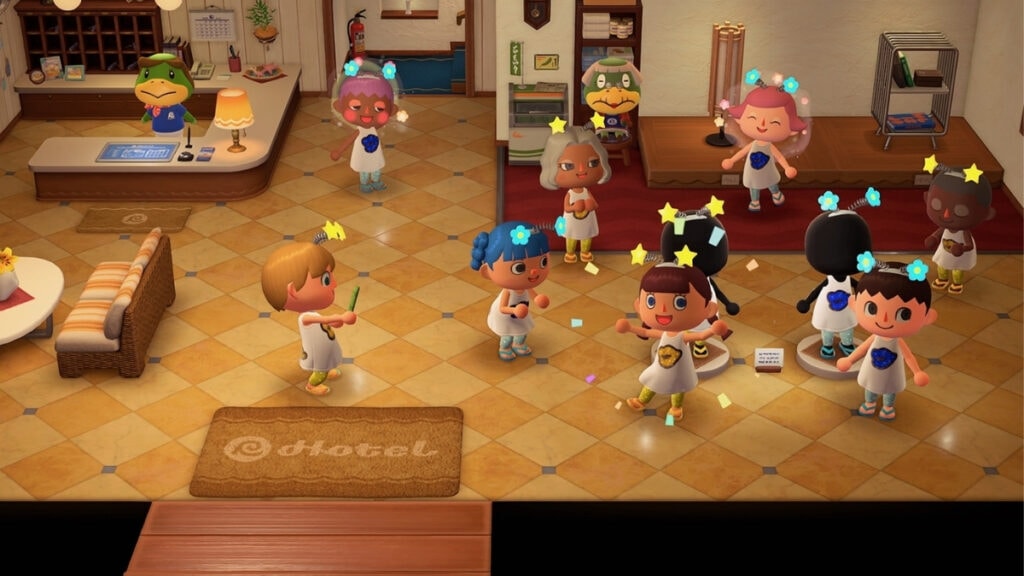 Des joueurs faisant la fête dans le nouvel hôtel d'Animal Crossing : New Horizons