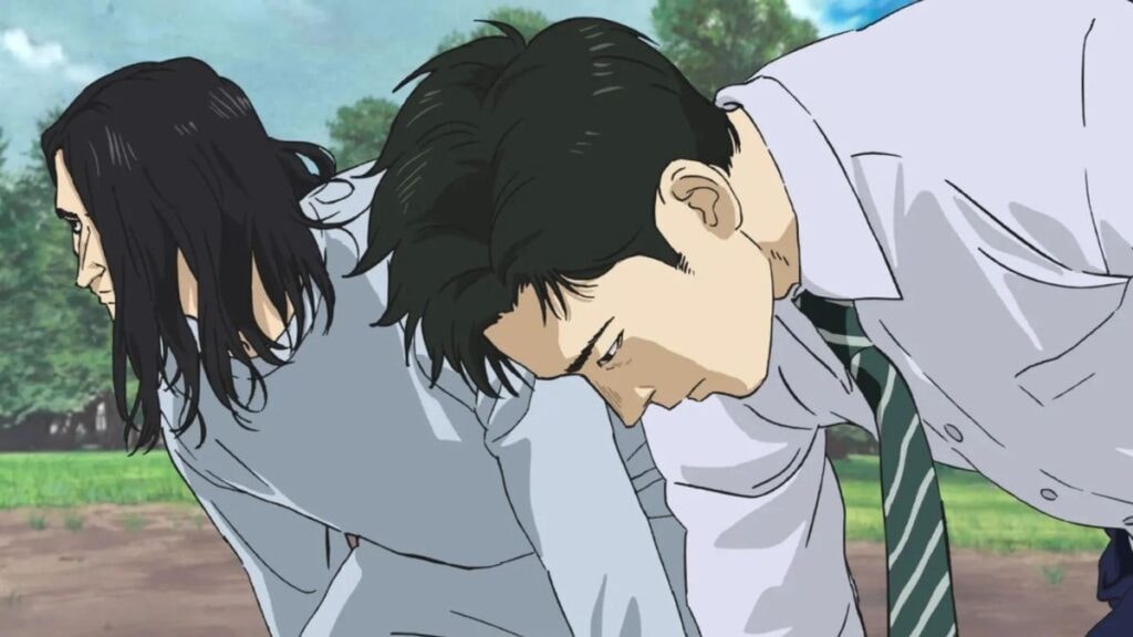 Nogami et Togashi prenant la position de départ avant une course dans 100 mètres