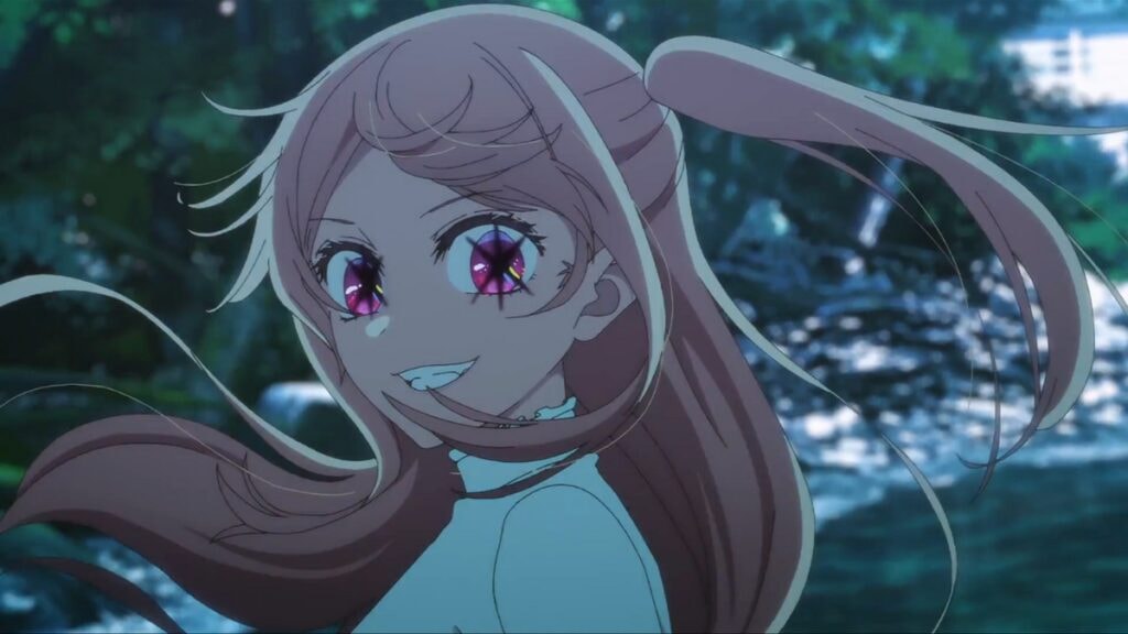 Ruby Hoshino souriant avec ses étoiles noires dans les yeux dans Oshi no Ko