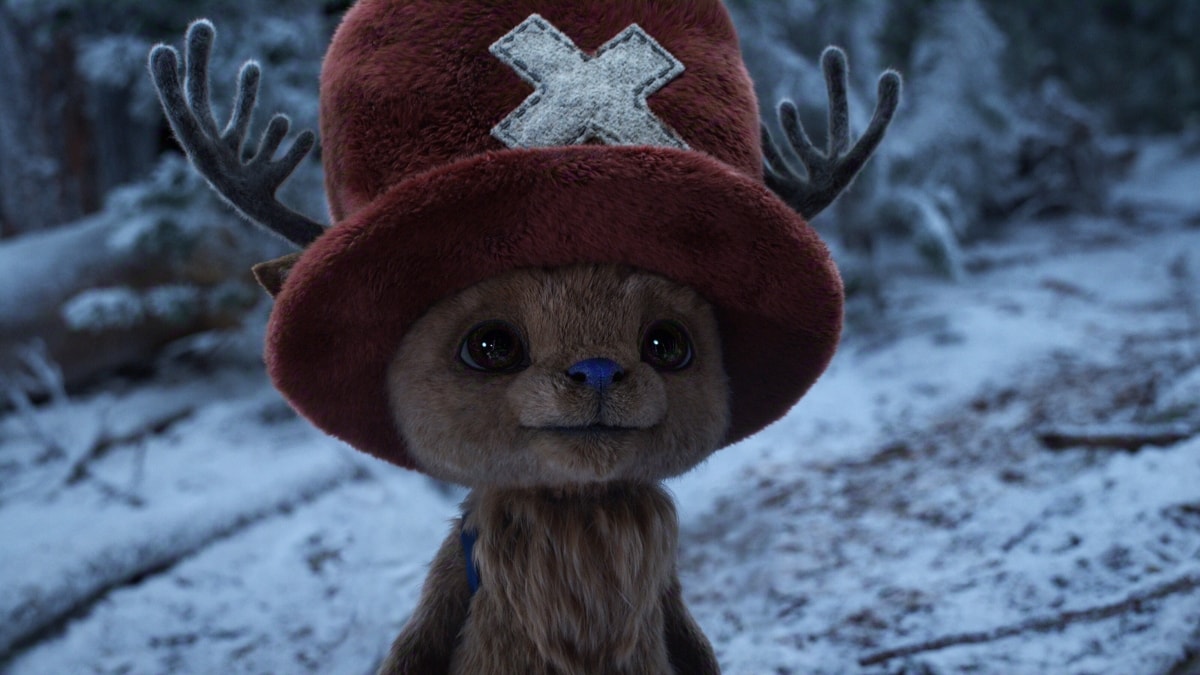 Chopper souriant dans la forêt enneigé de l'île de Drum de la série One Piece de Netflix